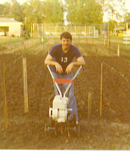 35/64 John working in garden, Spring 1979