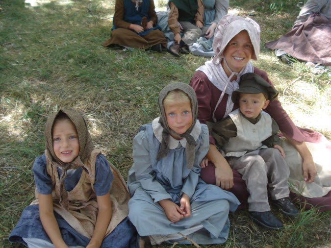 15/26 Three grandchildren (L-R) Adalyn Enslen, Alyssa Enslen, and John Edward Enslen with their mother Donna Enslen